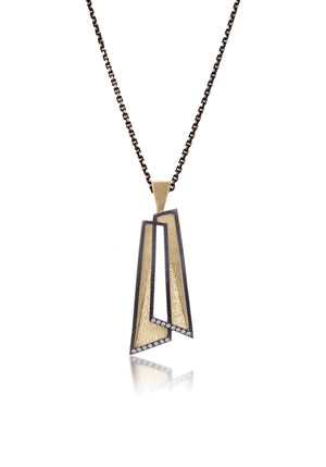 This oxidized sterling silver and richly textured 18k bimetal pendant is flush set with ideal cut white diamonds.  Accent facet glitters with the texture of diamond facets, individually scored and textured. Overlapping shapes with open areas.  Available with oxidized silver or 18k gold bail.  0.0483 tcw