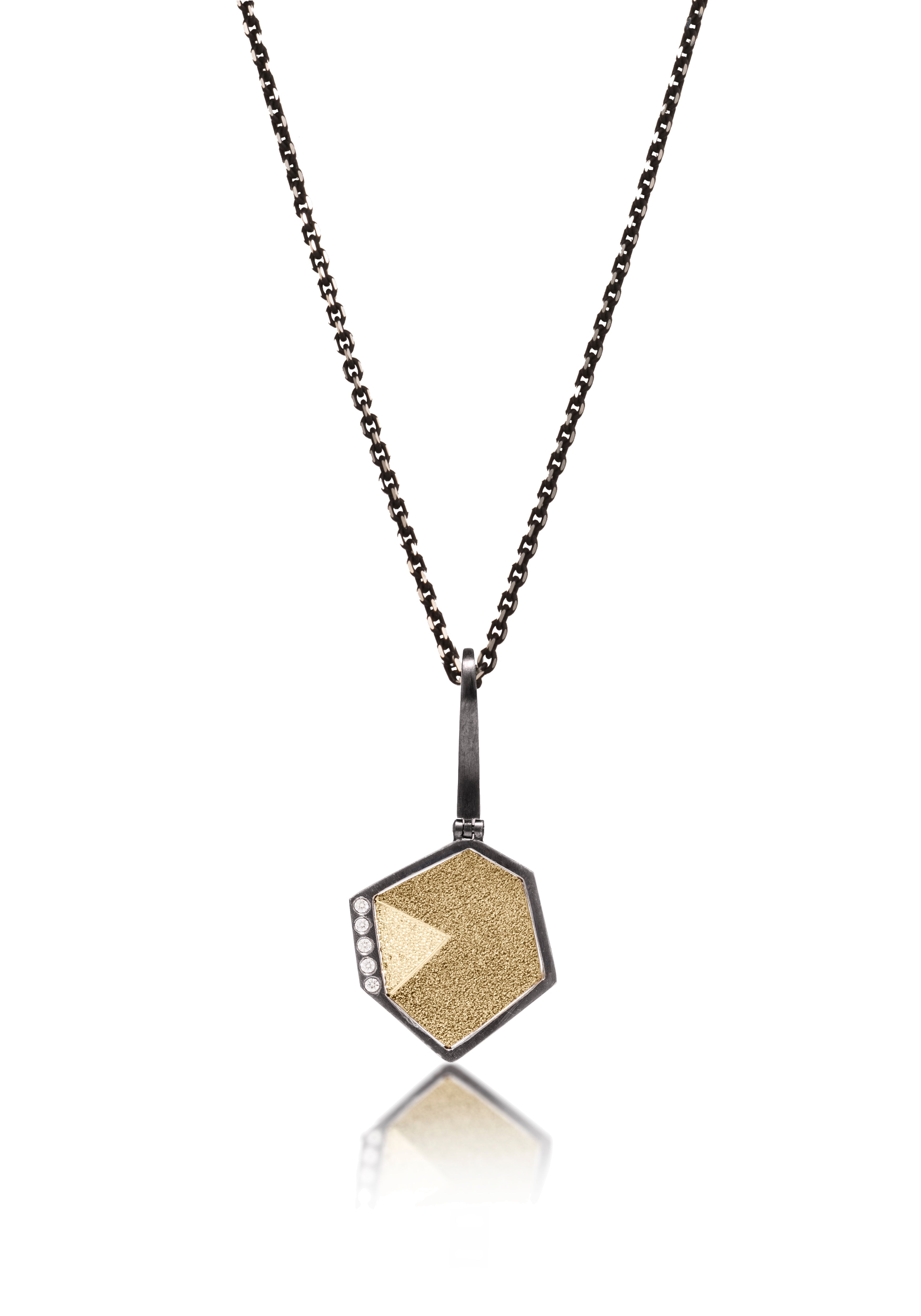 This oxidized sterling silver and richly textured 18k bimetal pendant is flush set with ideal cut white diamonds.  Accent facet glitters with the texture of diamond facets, individually scored and textured. Small size. Available in three oxidized sterling bail options, ID 3.25mm (pictured), fixed elongated, or elongated enhancer bail.