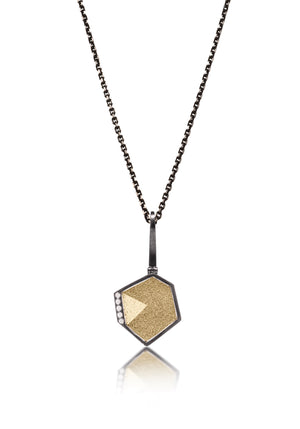 This oxidized sterling silver and richly textured 18k bimetal pendant is flush set with ideal cut white diamonds.  Accent facet glitters with the texture of diamond facets, individually scored and textured. Small size. Available in three oxidized sterling bail options, ID 3.25mm (pictured), fixed elongated, or elongated enhancer bail.