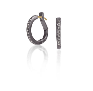 These simple, but elegant hoops are great on their own or accented with gem as a drop earring.  They feature white diamonds, 0.1656 tcw., and a built in closure that snaps securely closed.  Available in four color ways, oxidized silver, 18k gold, palladium or platinum.