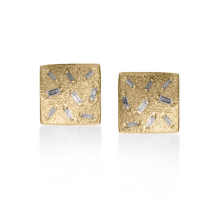 This simple yet elegant post earring is perfect for everyday.  Offered in three richly textured color ways, oxidized sterling, 18k gold, palladium.  Each earring set with 9 white diamond baguettes. 0.5 tcw.