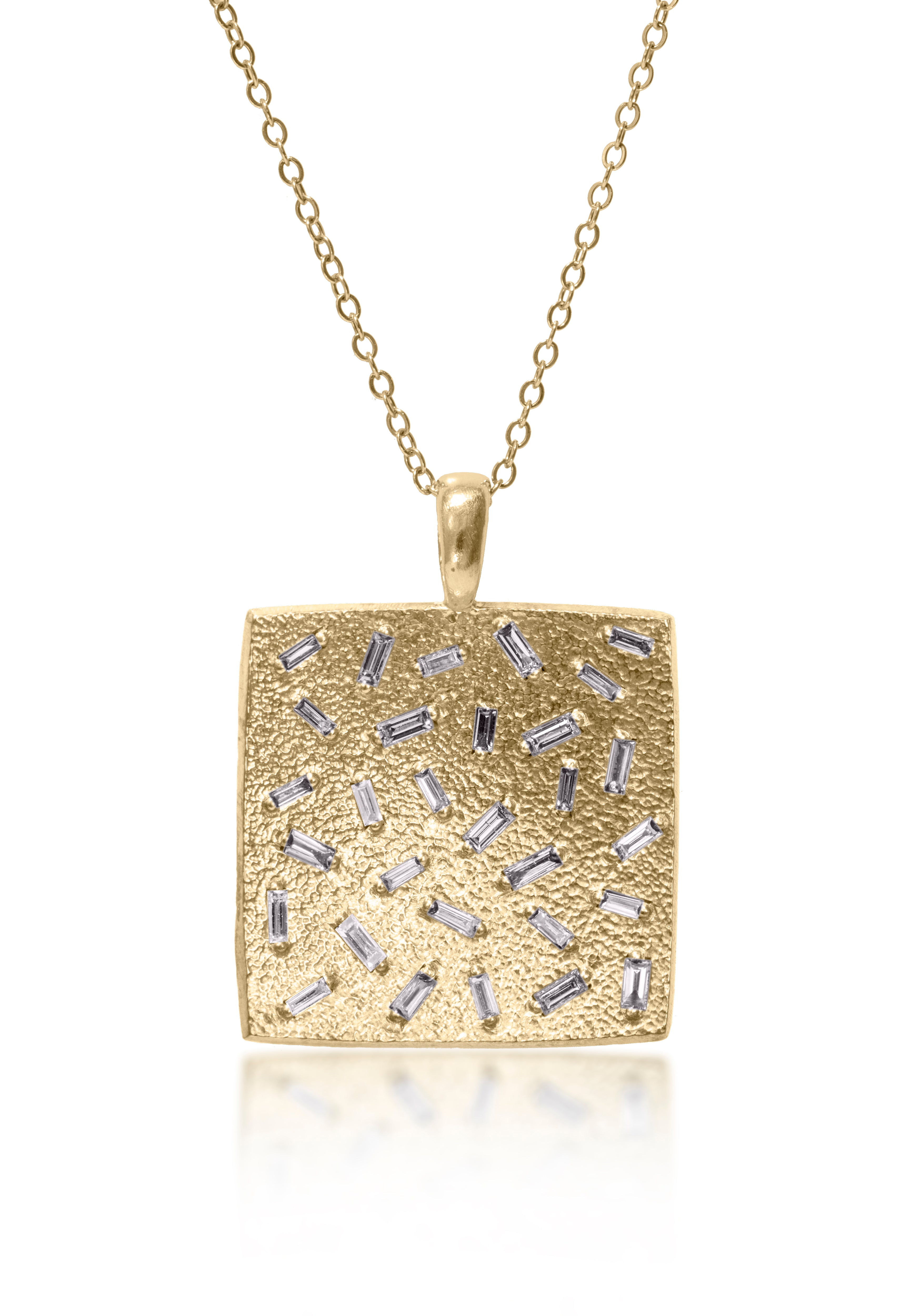 This larger square pendant features a stunning 30 white diamond baguettes. Richly textured, generous bail fits a wide range of chains. Available in three color ways, oxidized silver, 18k gold and palladium.  Price includes pendant only.  0.824 tcw.  