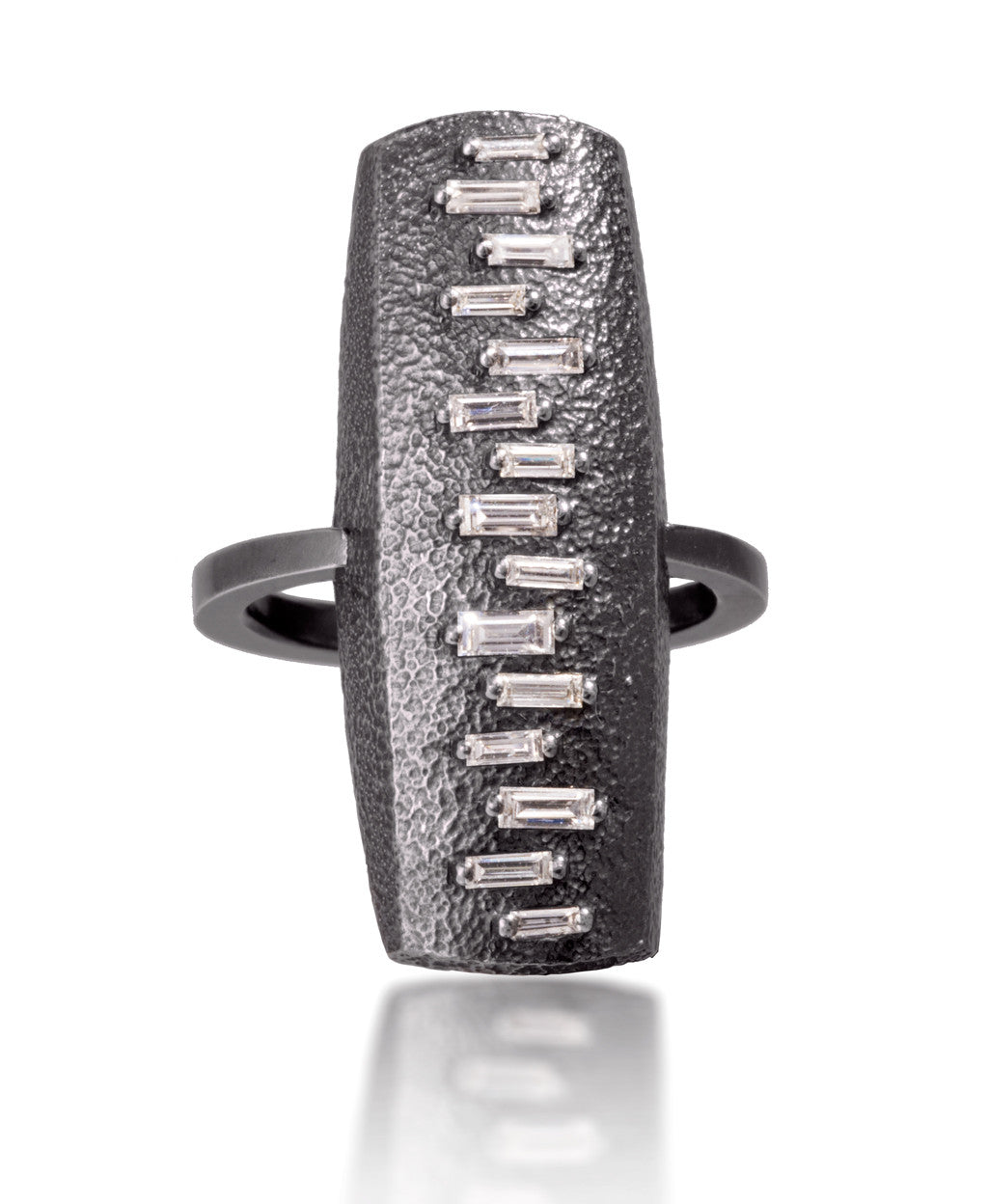 This large pendant ring is set with 15 white diamond baguettes. It is available in three richly textured color ways, oxidized silver, 18k gold, and palladium.  The graceful irregularity of the baguette angles catch the light in exciting ways when worn. 0.4713 tcw.