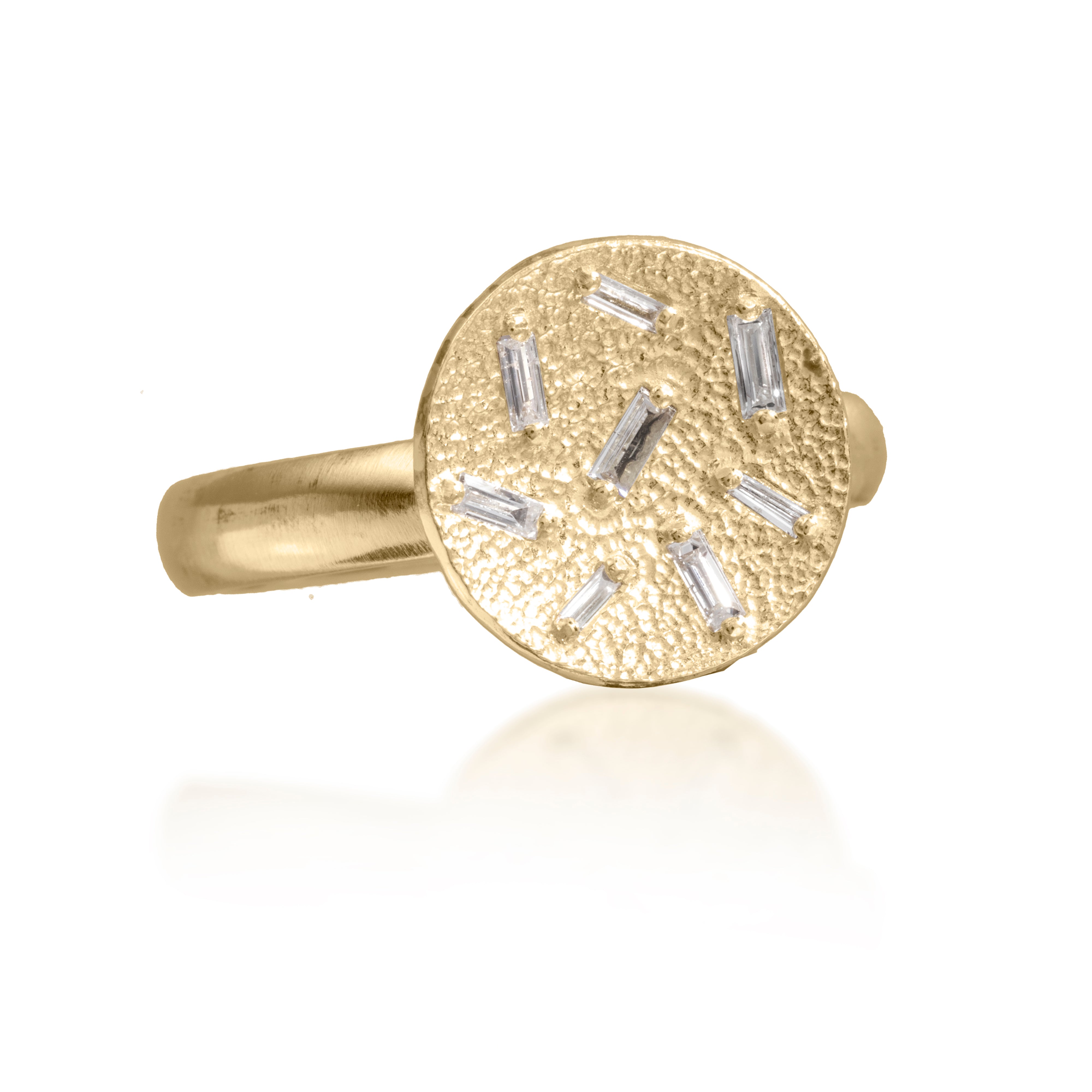 This small circular pendant ring is set with 8 white diamond baguettes. It is available in three richly textured color ways, oxidized silver, 18k gold and palladium.  The random angles of the baguettes catch the light in exciting ways when worn. 0.227 tcw.