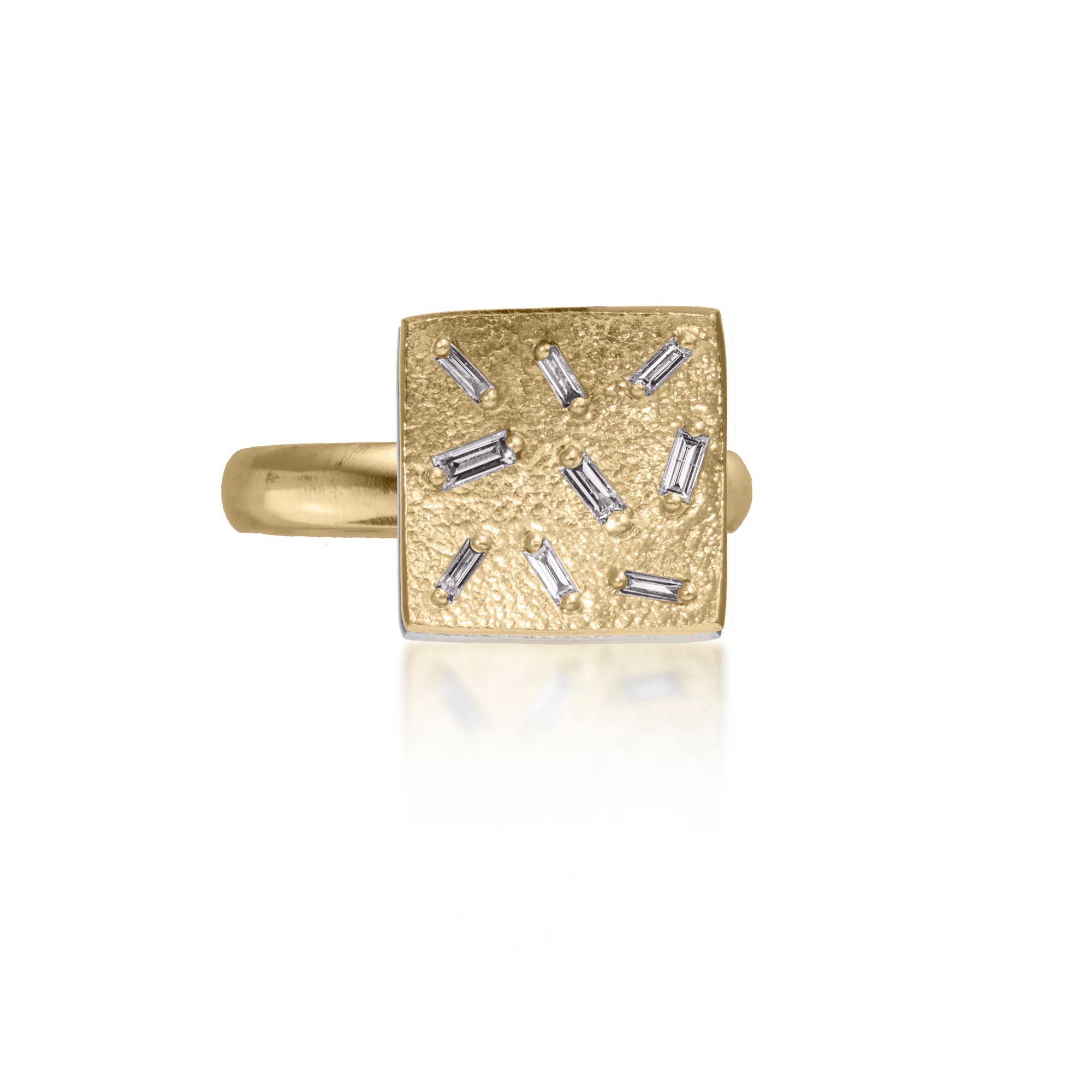 This small square pendant ring is set with 9 white diamond baguettes. It is available in three richly textured color ways, oxidized silver, 18k gold and palladium. The random angles of the baguettes catch the light in exciting ways when worn. 0.25 tcw.