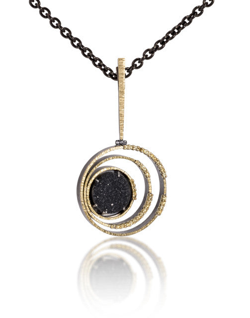 Spiral Pendant #2 in 18k gold backed with oxidized sterling silver, prong set black drusy and natural yellow diamonds. Hand fabricated, hammer textured. 14k yellow gold clip allows pendant to be attached to any chain or loop. 12mm black onyx drusy.