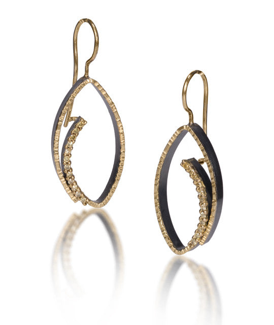 Tempest Earring #3, size medium in 18k gold and oxidized sterling silver with prong set natural yellow diamonds. 18k earwire with closure. Forged, textured and fabricated by hand. 0.1728 tcw.