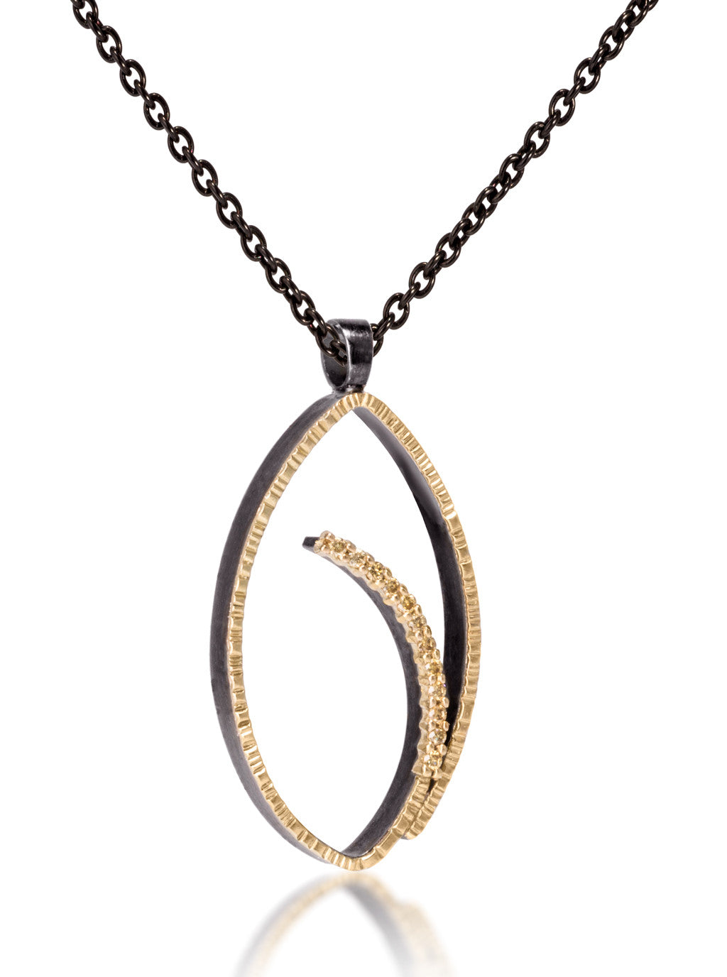 Tempest pendant #1-Large in 18k gold and oxidized sterling silver with prong set natural yellow diamonds. Forged, textured and fabricated by hand. 0.0864 tcw.