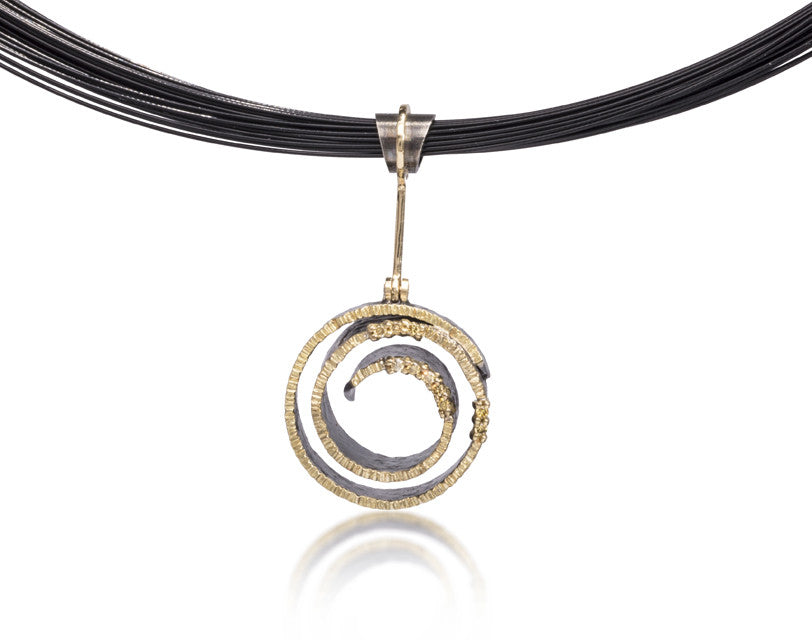 Vortex Pendant #1 in 18k gold and oxidized sterling silver, prong set with natural yellow diamonds. Hand forged and fabricated. Hinged bail.0.072 tcw